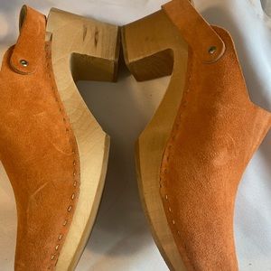 Orange leather clogs